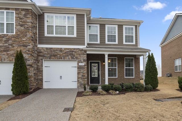 view of front of house featuring covered porch and a garage