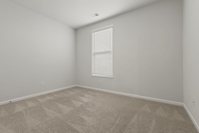 spare room with carpet flooring