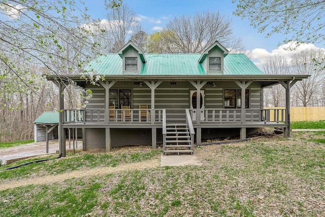 view of front of home featuring a porch and a front lawn