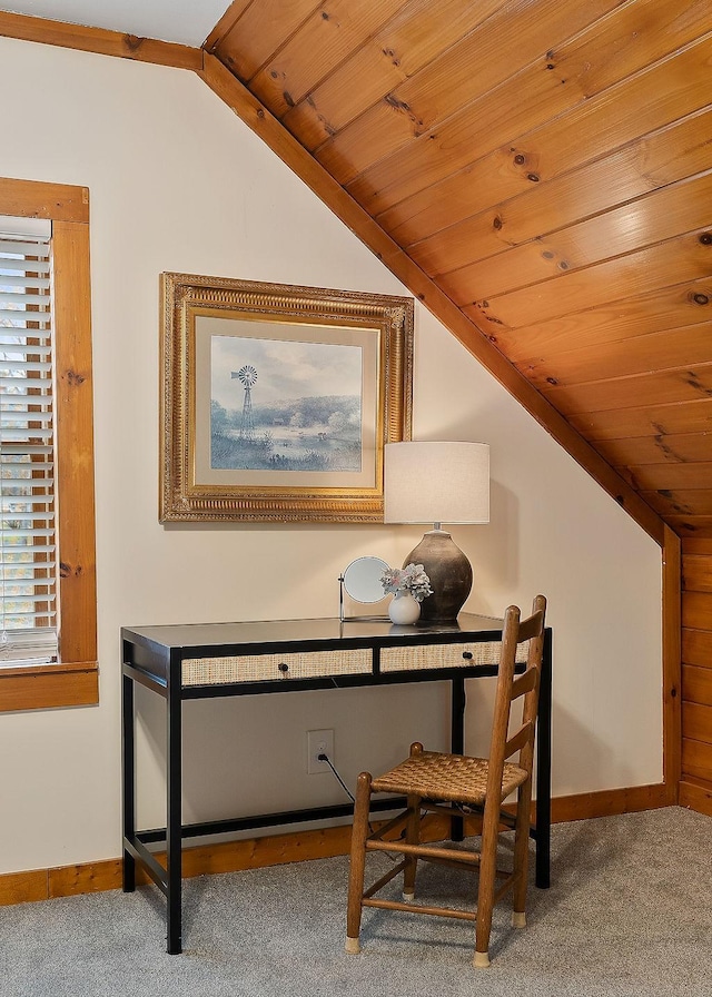 carpeted office with lofted ceiling and wooden ceiling