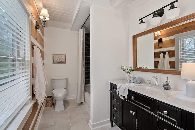 full bathroom featuring vanity, shower / bath combination with curtain, and toilet