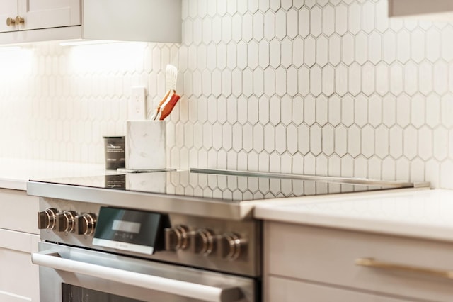 interior details featuring stainless steel range oven