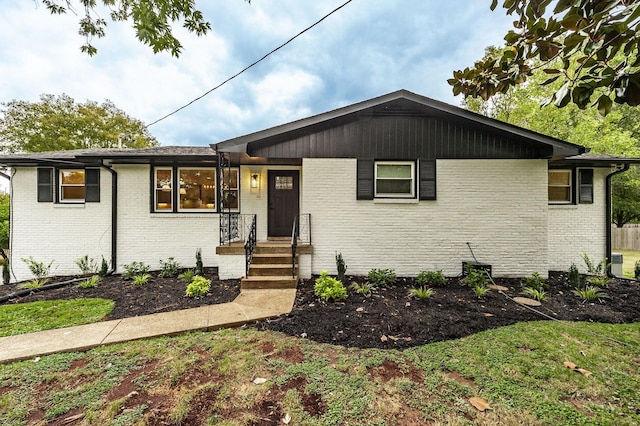 ranch-style house with central AC