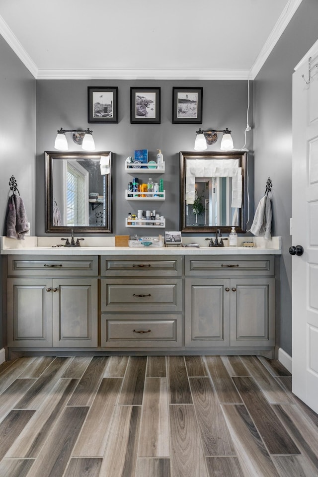 bathroom with vanity and crown molding