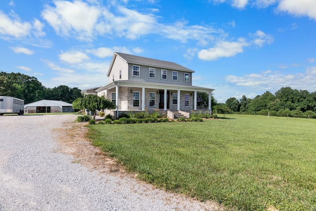 view of front of home featuring a front lawn and a porch