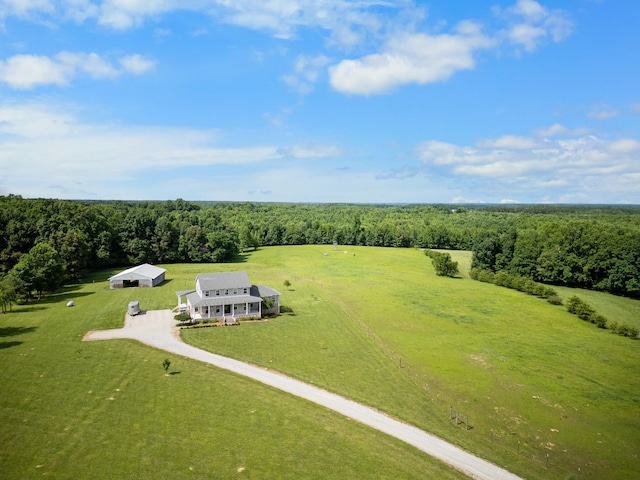 birds eye view of property featuring a rural view