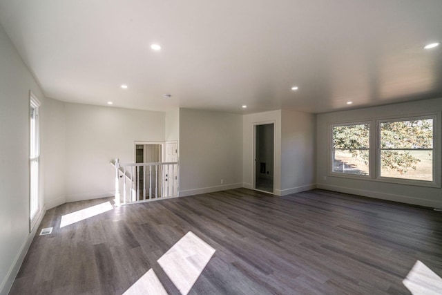 empty room featuring dark hardwood / wood-style floors