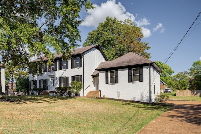 view of front of property with a front lawn