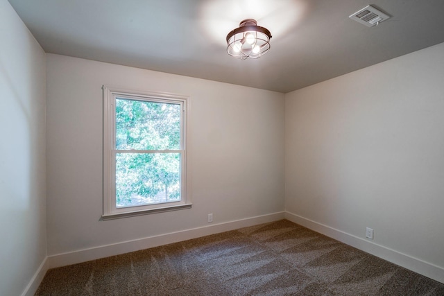 unfurnished room with carpet