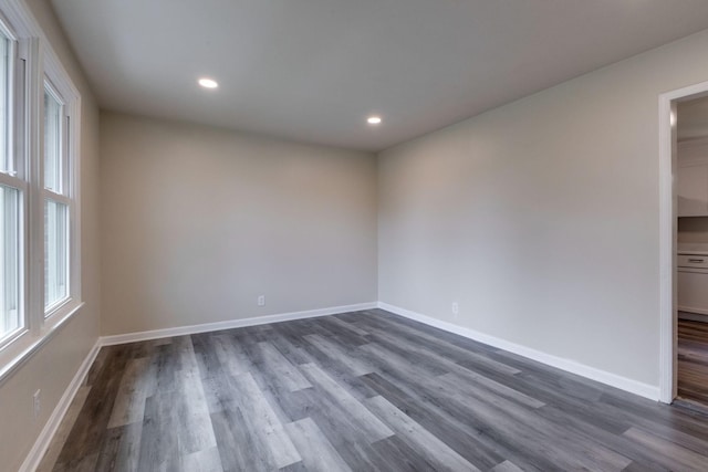 empty room featuring dark hardwood / wood-style floors