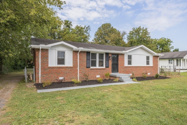 view of front facade with a front yard