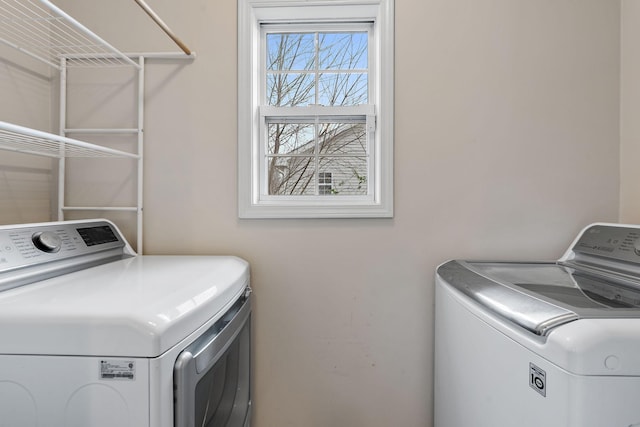 washroom featuring separate washer and dryer