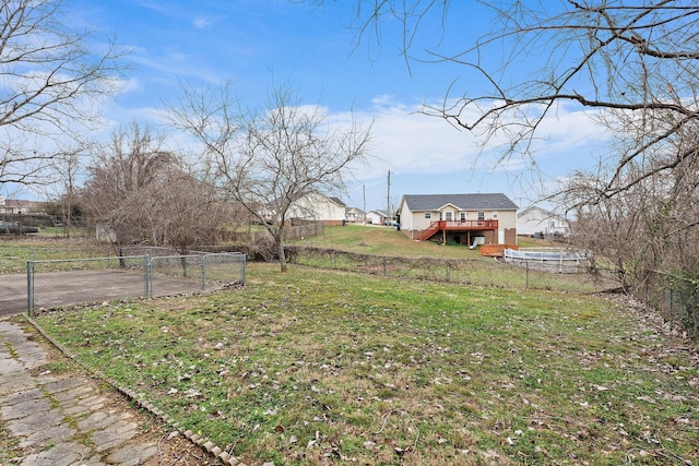 view of yard with a wooden deck