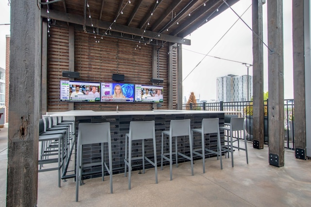 view of patio / terrace with an outdoor bar