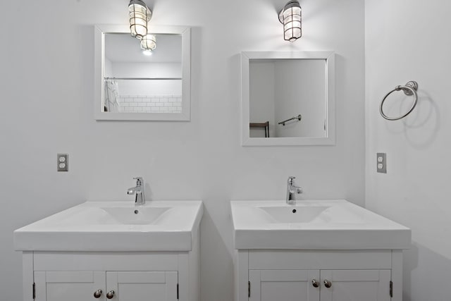 bathroom featuring vanity and walk in shower