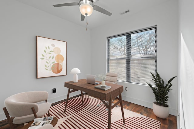 office space with hardwood / wood-style flooring and ceiling fan