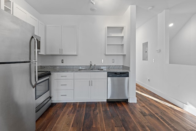 kitchen with dark hardwood / wood-style flooring, stainless steel appliances, white cabinetry, and sink