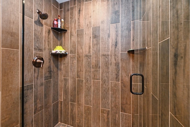 bathroom featuring an enclosed shower