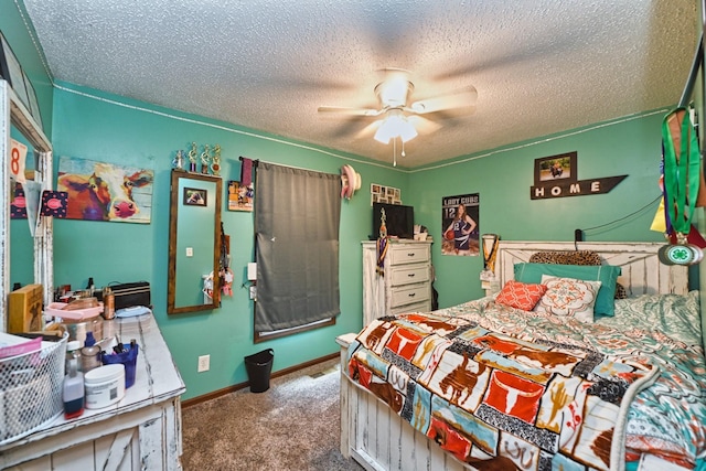 bedroom featuring ceiling fan, carpet, and a textured ceiling