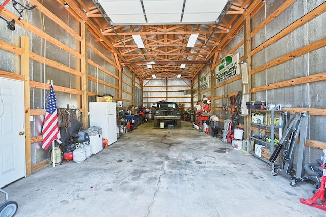 garage with white fridge