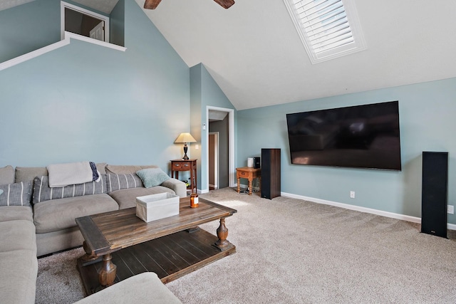 carpeted living room featuring ceiling fan and lofted ceiling