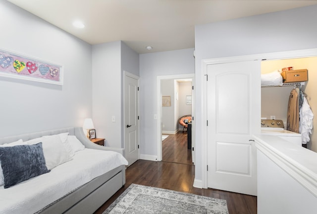 bedroom with dark wood-type flooring