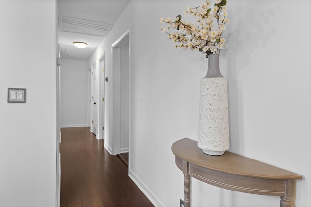 hall with dark hardwood / wood-style floors