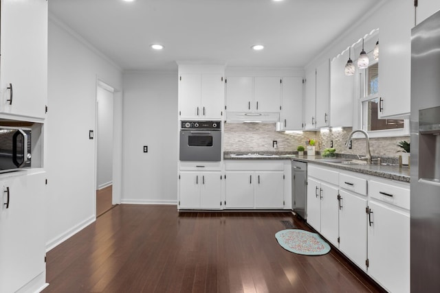 kitchen featuring white cabinets, dishwasher, sink, and oven