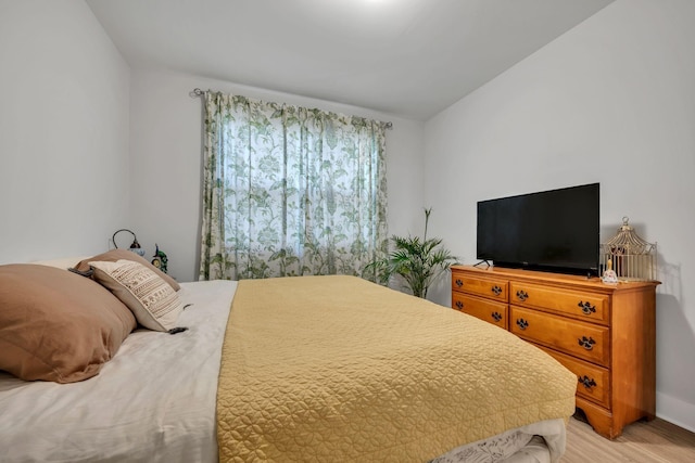 bedroom featuring light hardwood / wood-style floors