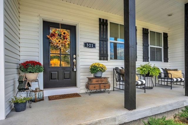 entrance to property with a porch