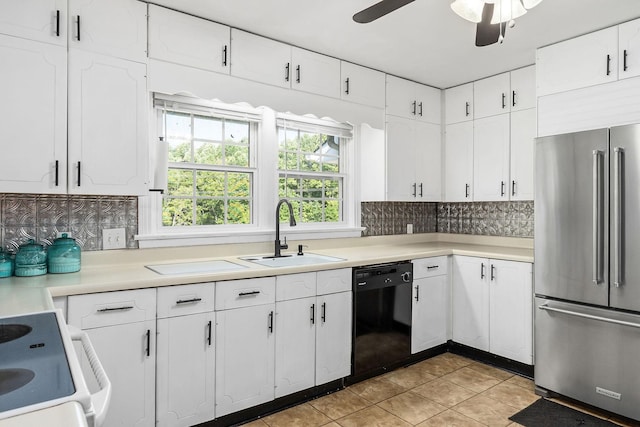 kitchen with dishwasher, white cabinets, high end fridge, and sink