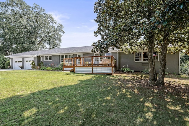 ranch-style home with a front lawn, a garage, and a deck