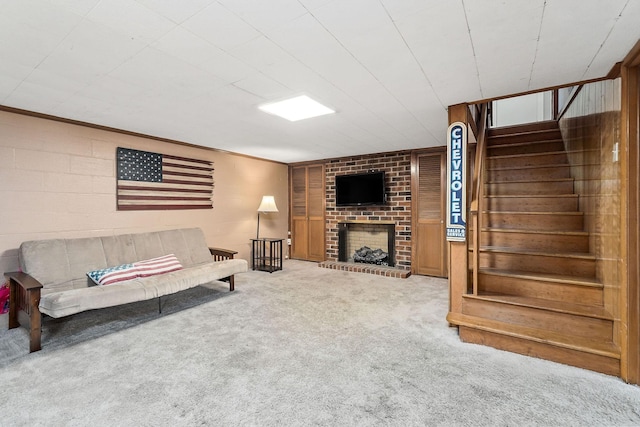 living room featuring carpet flooring and a brick fireplace