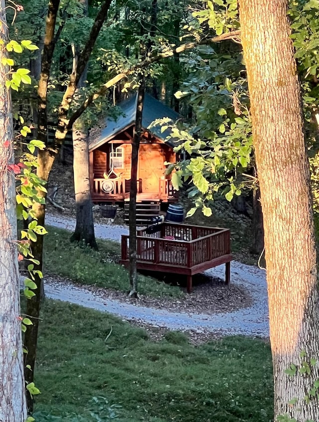 view of yard featuring a wooden deck