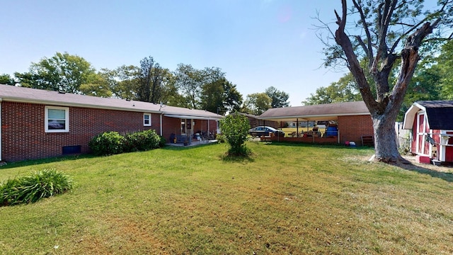 view of yard with a carport