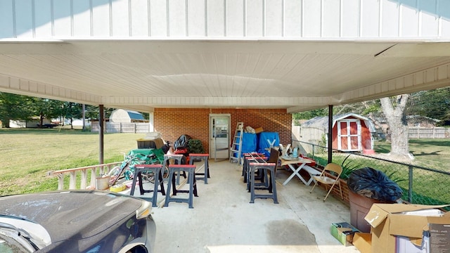 view of patio / terrace featuring a shed