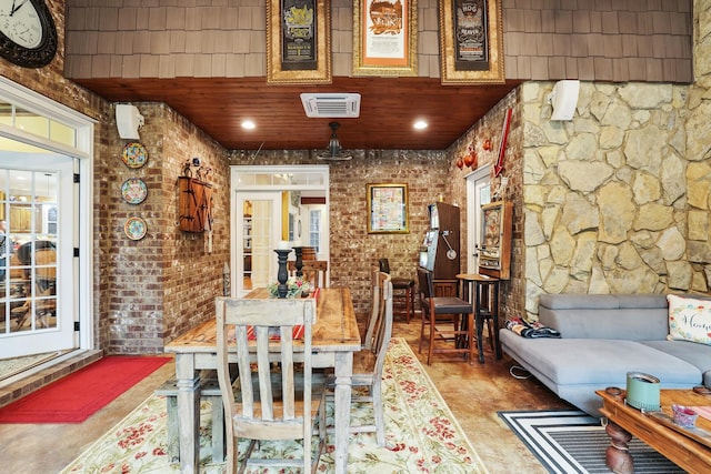 dining room with wooden ceiling