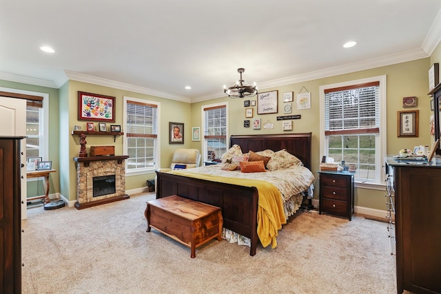 bedroom featuring a stone fireplace, light colored carpet, crown molding, and a chandelier