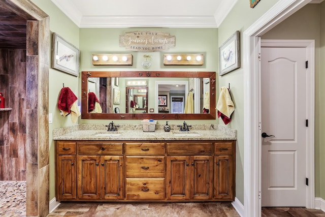 bathroom featuring vanity and ornamental molding