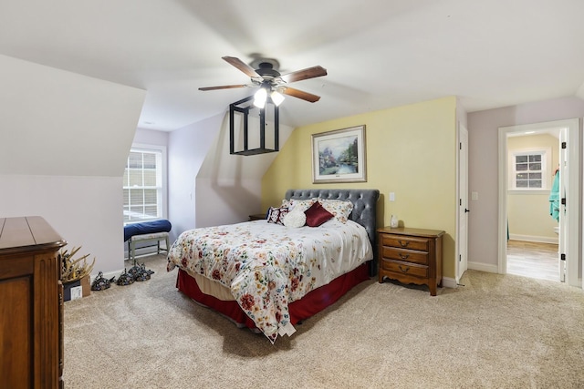 carpeted bedroom with ceiling fan