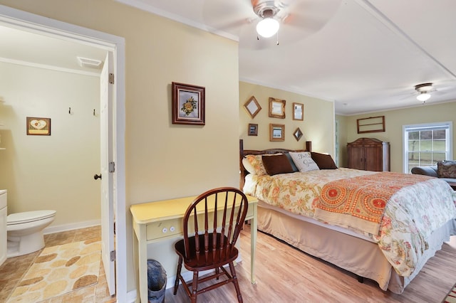 bedroom featuring ceiling fan and crown molding