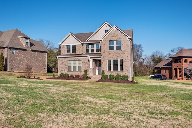 view of front of home featuring a front yard