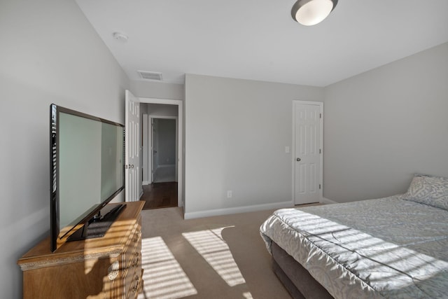 carpeted bedroom featuring a closet