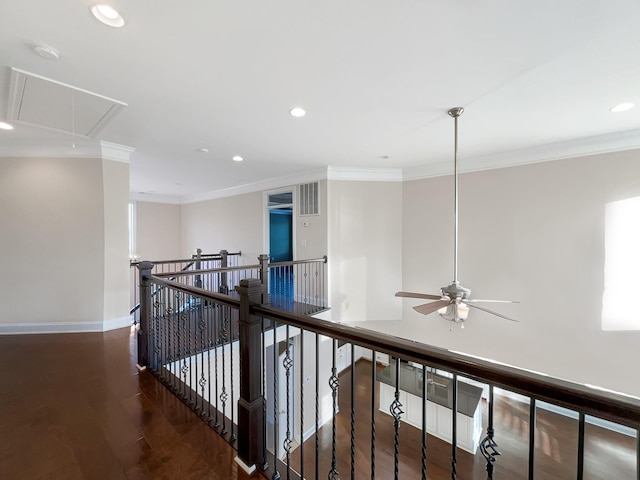 hallway with dark hardwood / wood-style floors and ornamental molding