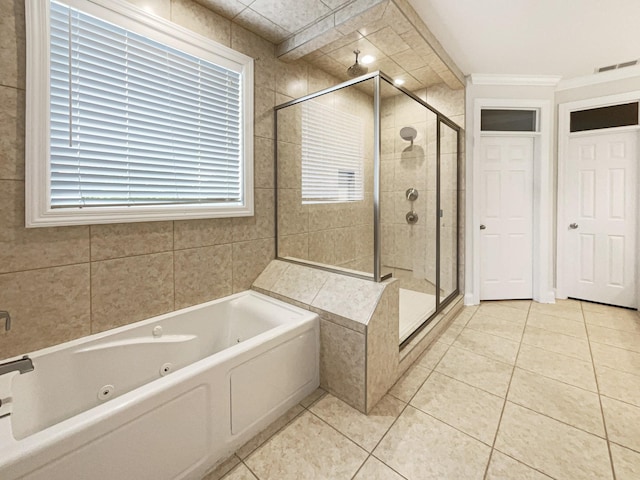 full bathroom with a stall shower, a whirlpool tub, visible vents, and tile patterned floors