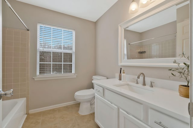 full bathroom with tile patterned floors, vanity, toilet, and tiled shower / bath combo