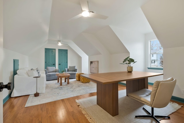 office with ceiling fan, light wood-type flooring, and lofted ceiling