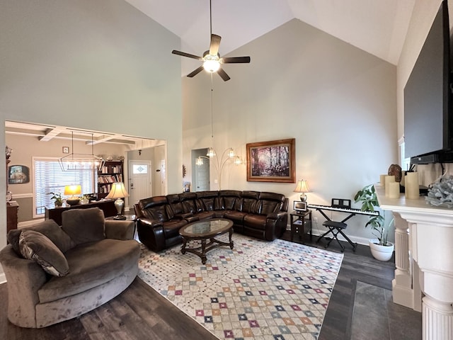 living room featuring dark hardwood / wood-style floors, high vaulted ceiling, and ceiling fan