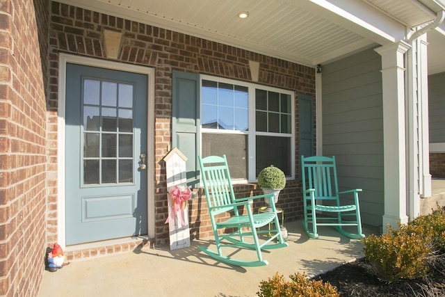 entrance to property with a porch