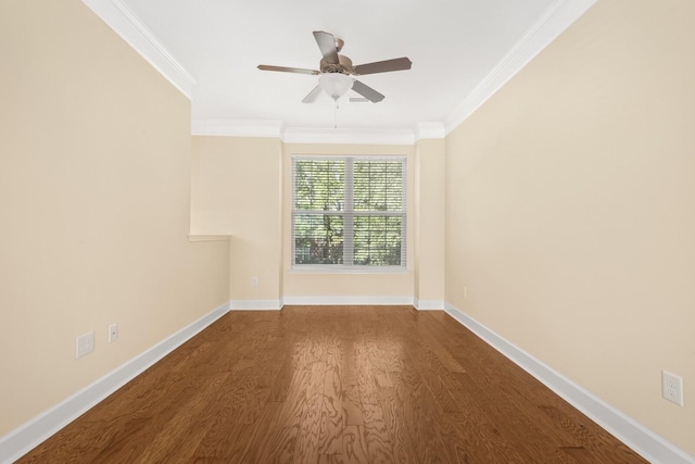 empty room featuring ceiling fan, hardwood / wood-style floors, and ornamental molding